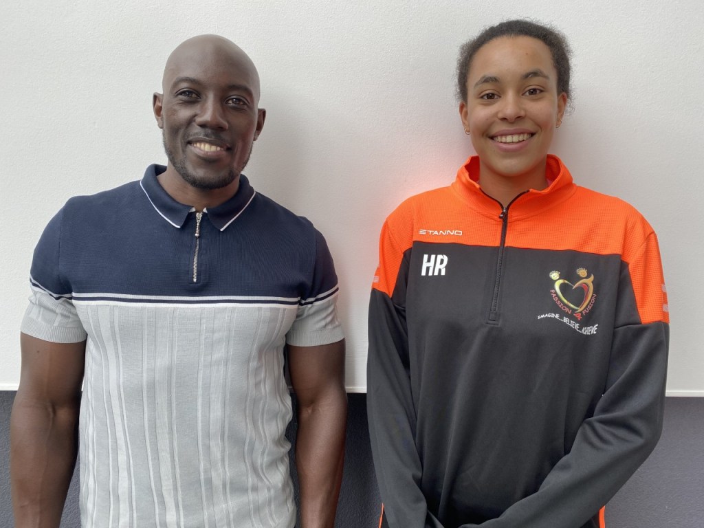 Jonathan and Anna smile at the camera.