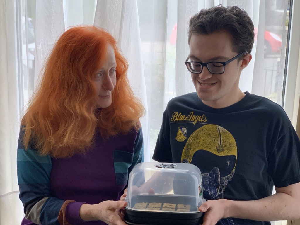 Alison pictured with son, Aodán at their home in Aberdeen. Alison looks lovingly at her son as they hold some baked treats.