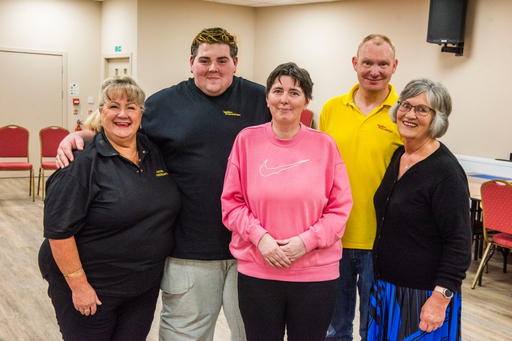 a group of people smiling 