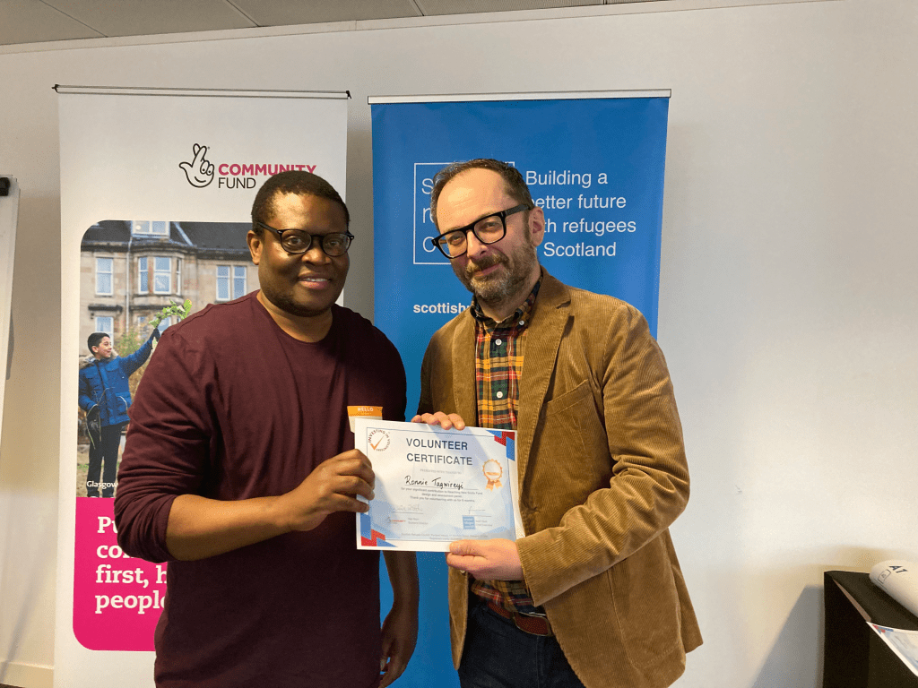 Ronnie accepting his volunteer certificate.